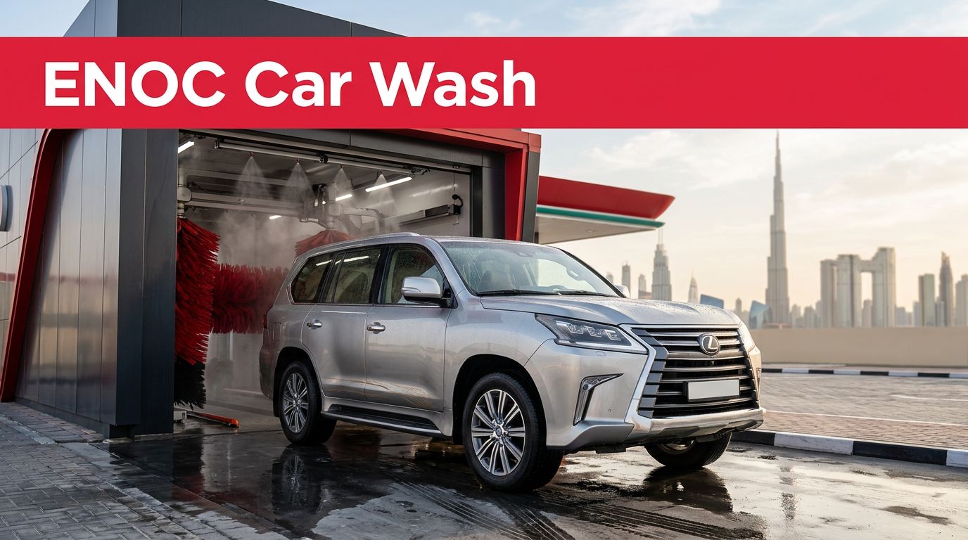 Silver SUV leaving a car wash with Dubai skyline behind it.