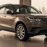 A clean SUV gleams in a Dubai service bay with water beads and spotless wheels.